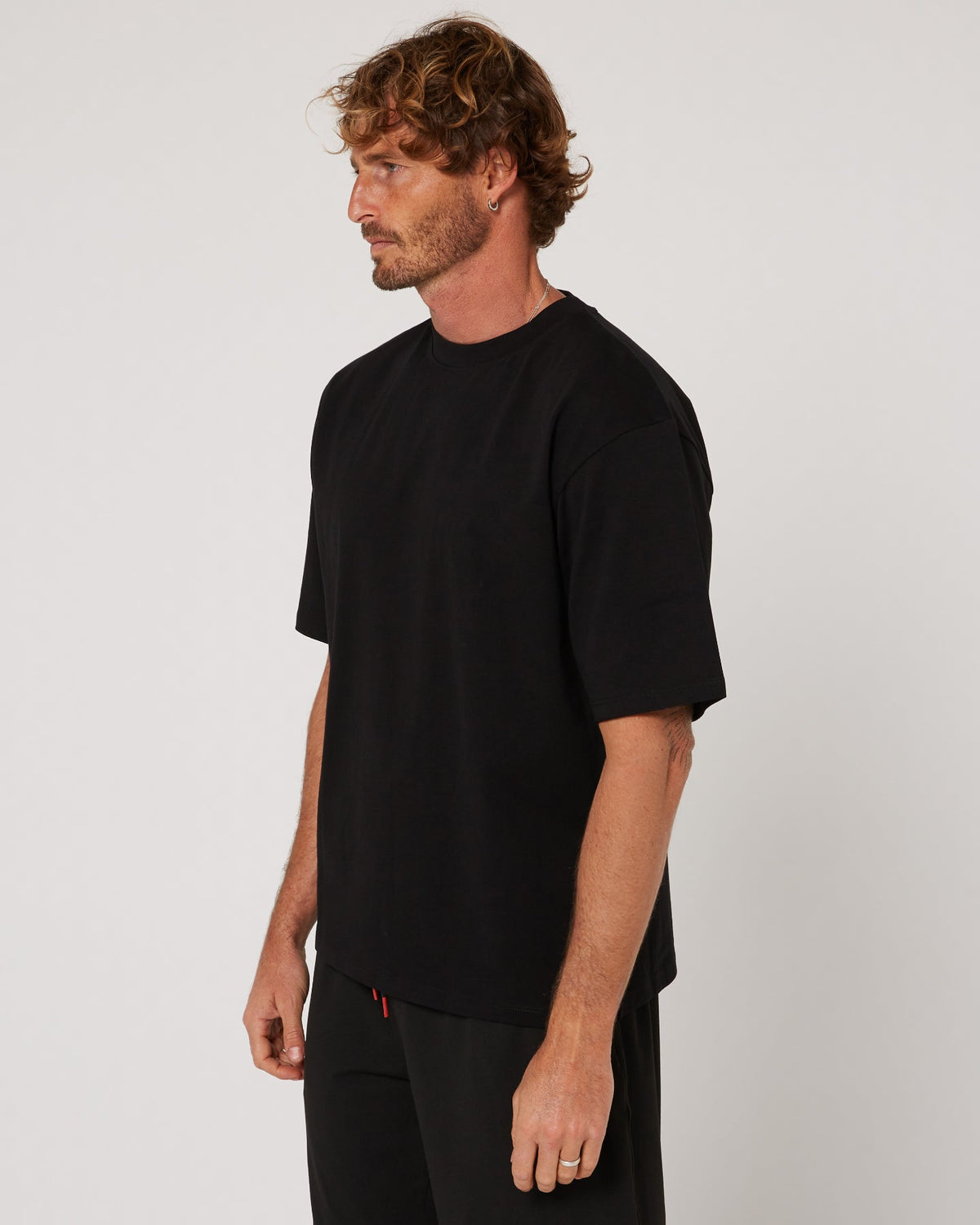 Follow Modern Tee - Black, side view