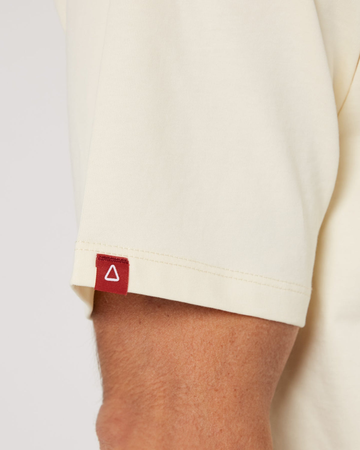 Follow Modern Tee - Cream, in use