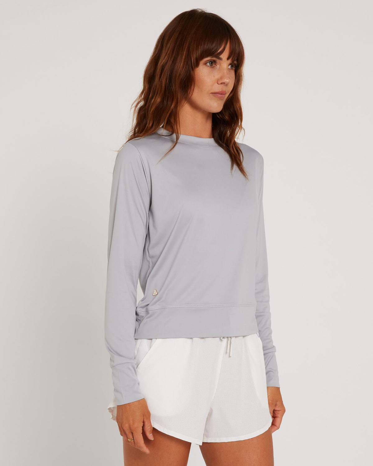 Follow Elara Sun Tee L/S - Light Grey, on water